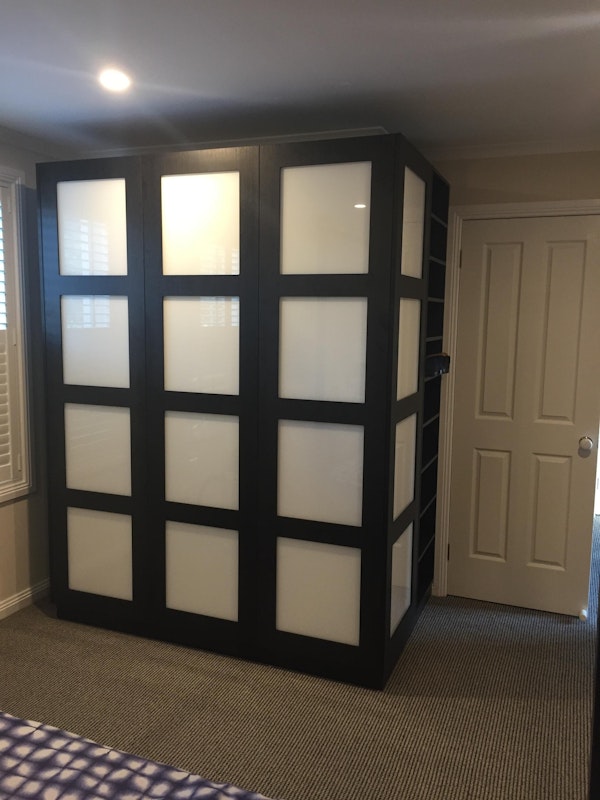 Black and White Glass swing doors and matching end panel
