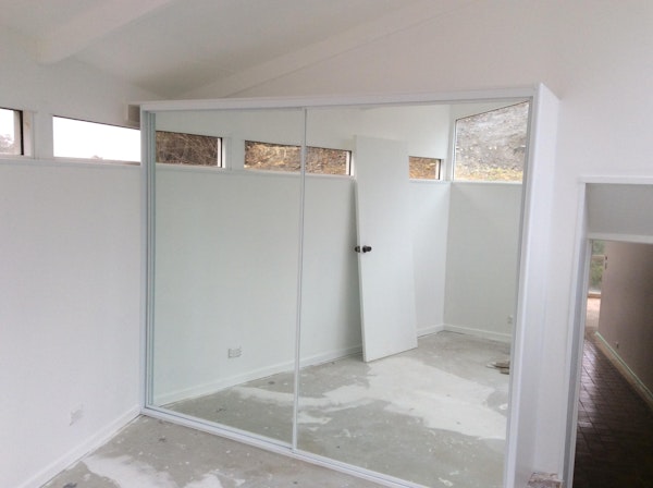 Sliding Door mirror robe with lid sloping ceiling and next to window